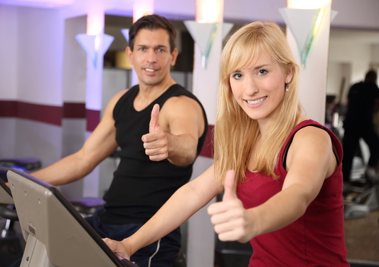2 people on treadmills